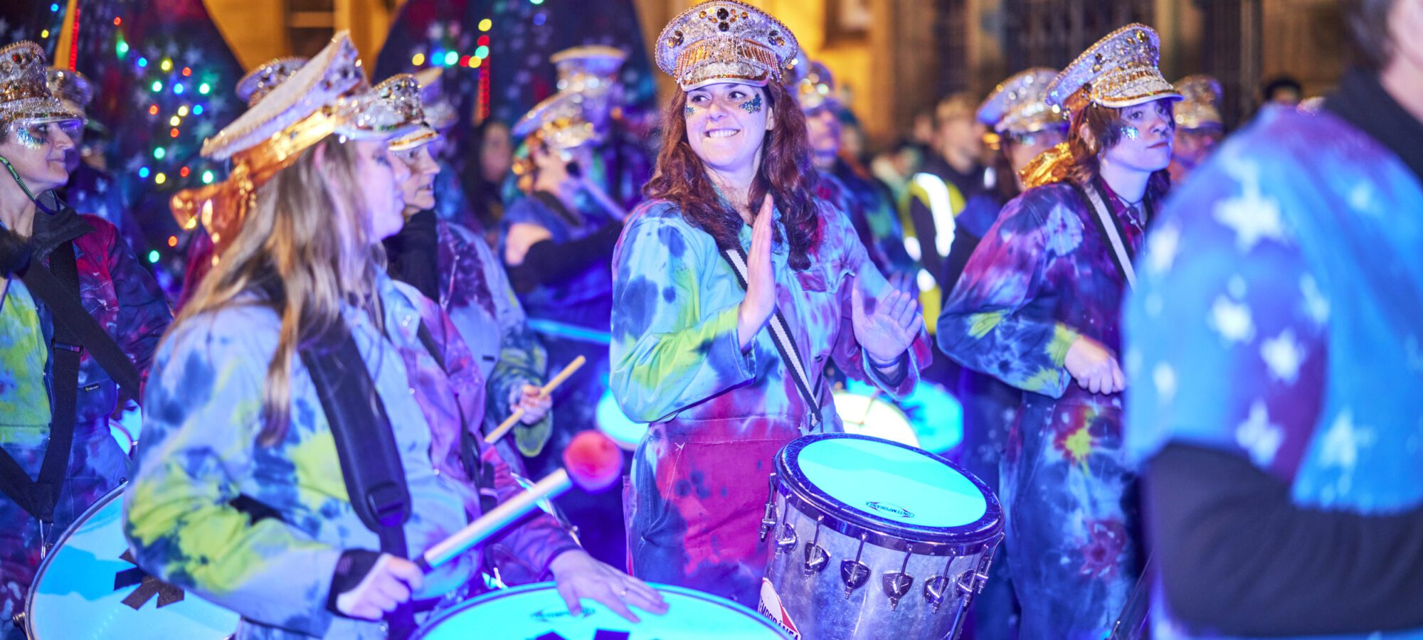 An LED drummer playing in a Carnival